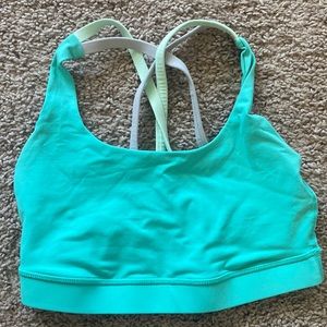 Lulu lemon sports bra, green and gray, criss-cross back detailing, size 2